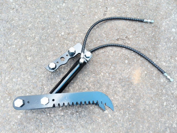 Hydraulicky pridržiavač palec